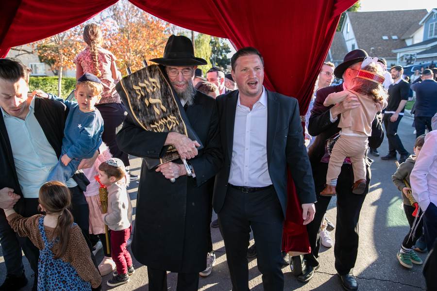 Dancing with the Sefer Torah beneath the chuppah