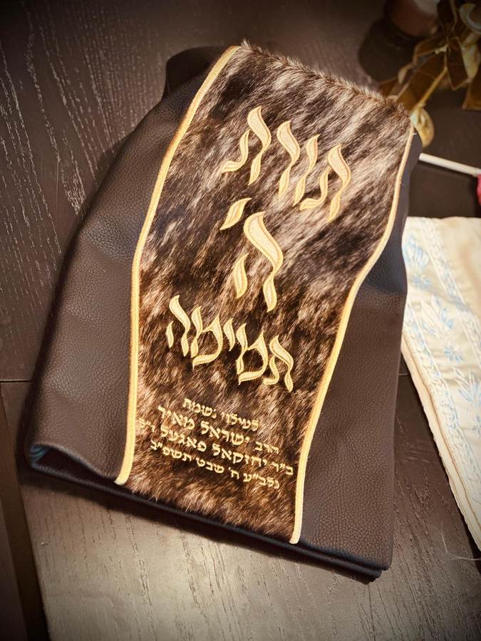 The velvet mantle of the new Sefer Torah